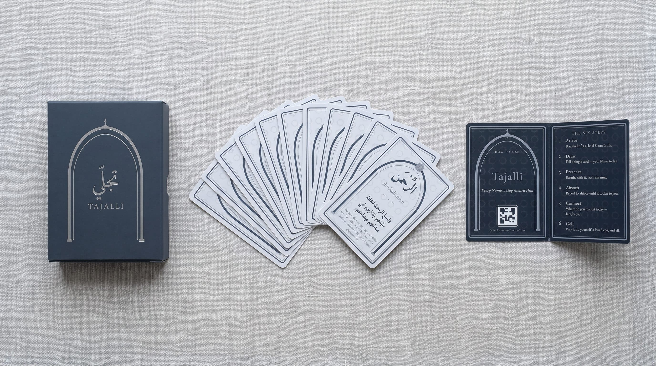 The full Tajalli deck laid out — cards, fold-out guide, and box